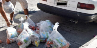 Presuntos miembros del CJNG reparten despensas a fectados tras intensas lluvias en Veracruz Presuntos miembros del CJNG reparten despensas a fectados tras intensas lluvias en Veracruz