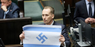 “Israel es un nuevo Tercer Reich”, dice diputado polaco mostrando una bandera israelí con una esvástica "Israel es un nuevo Tercer Reich", dice diputado polaco mostrando una bandera israelí con una esvástica